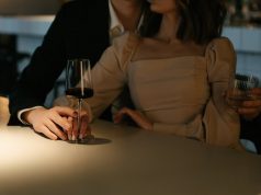 Couple Holding Wine Glass
